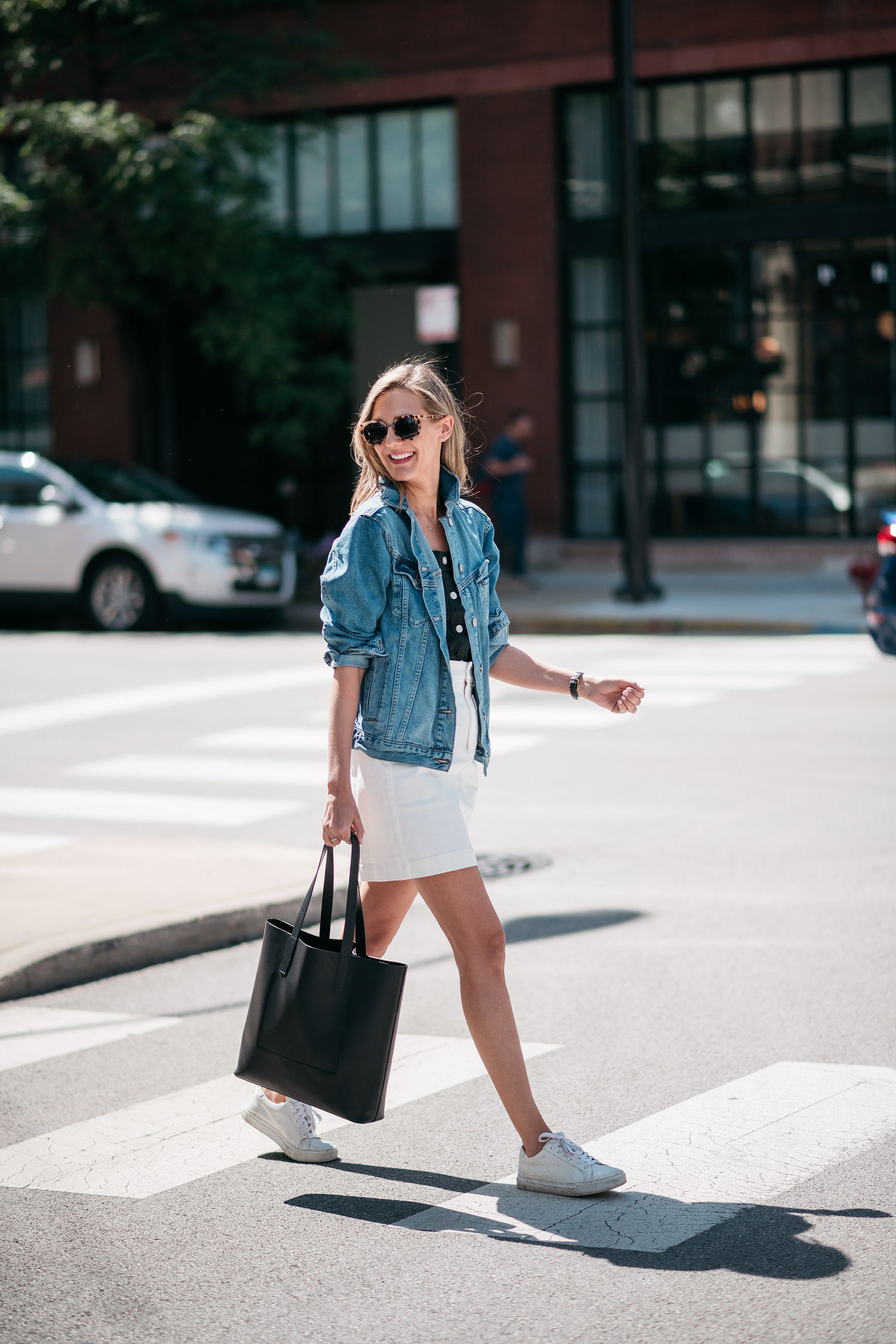 white skirt with jean jacket sneakers