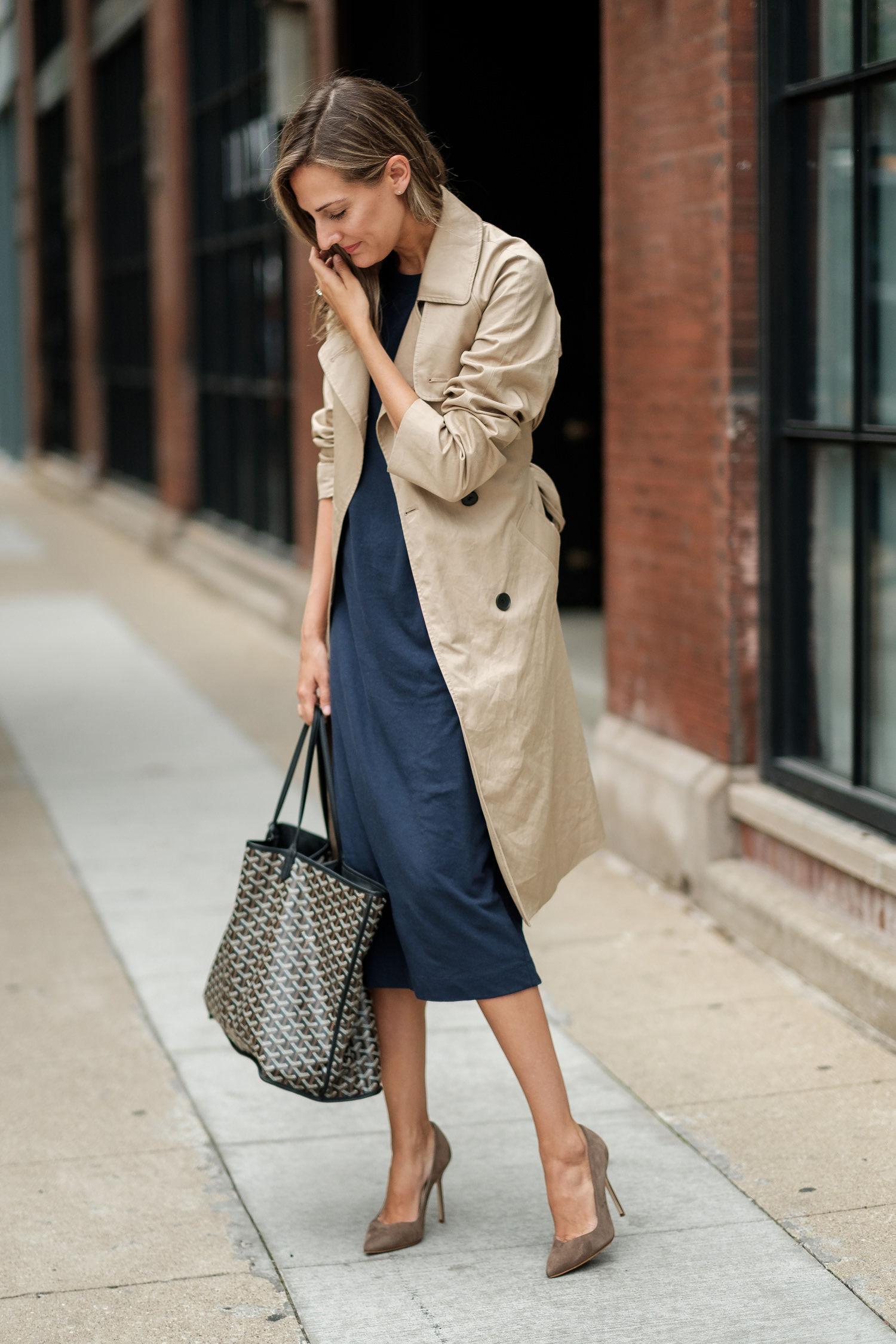 woman in classic work outfit trench shirt dress