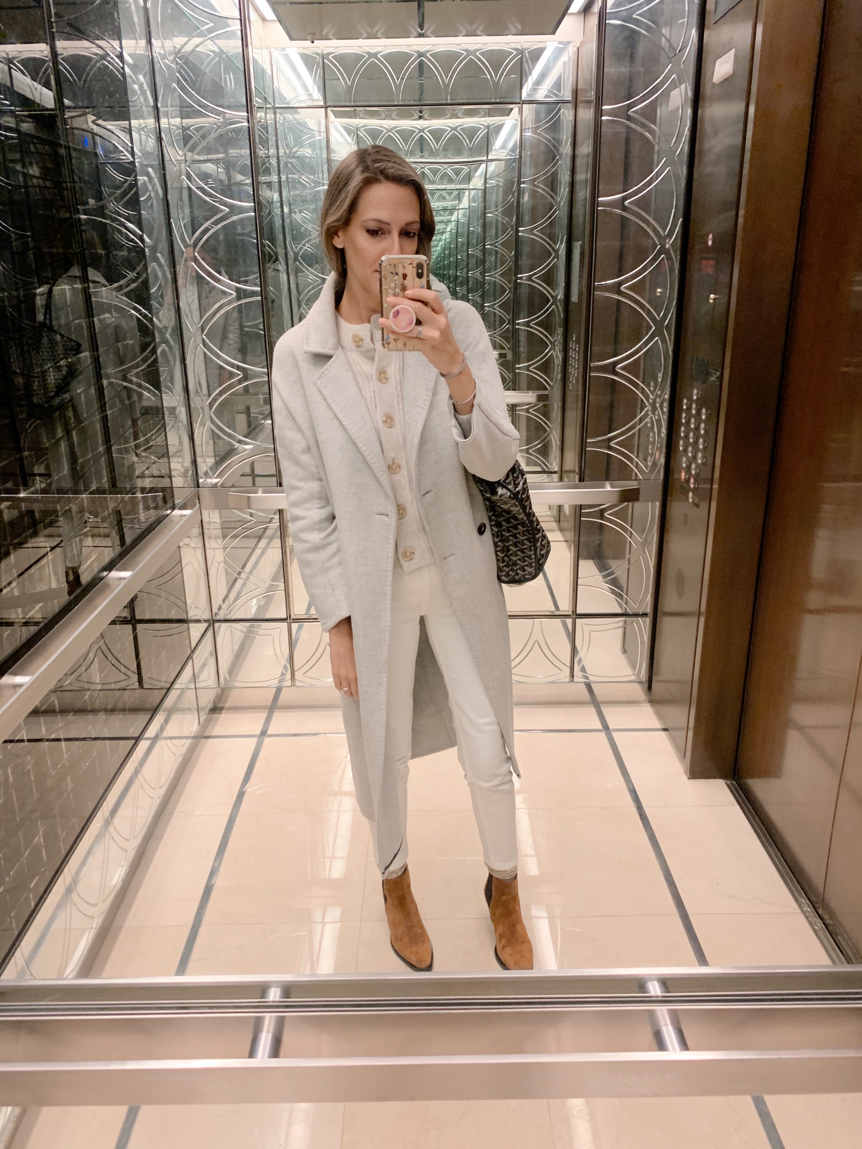 woman sharing her Real outfit recap Date Nights in all white outfit and white trench coat