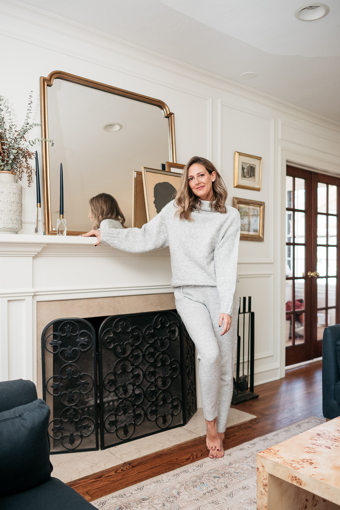 woman at home in grey lounge wear for Cozy Cyber Monday