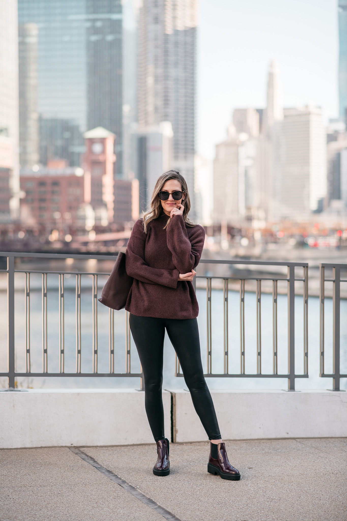 woman wearing sweater, leggings, boots, and sunglasses from Nordstrom Made Brands