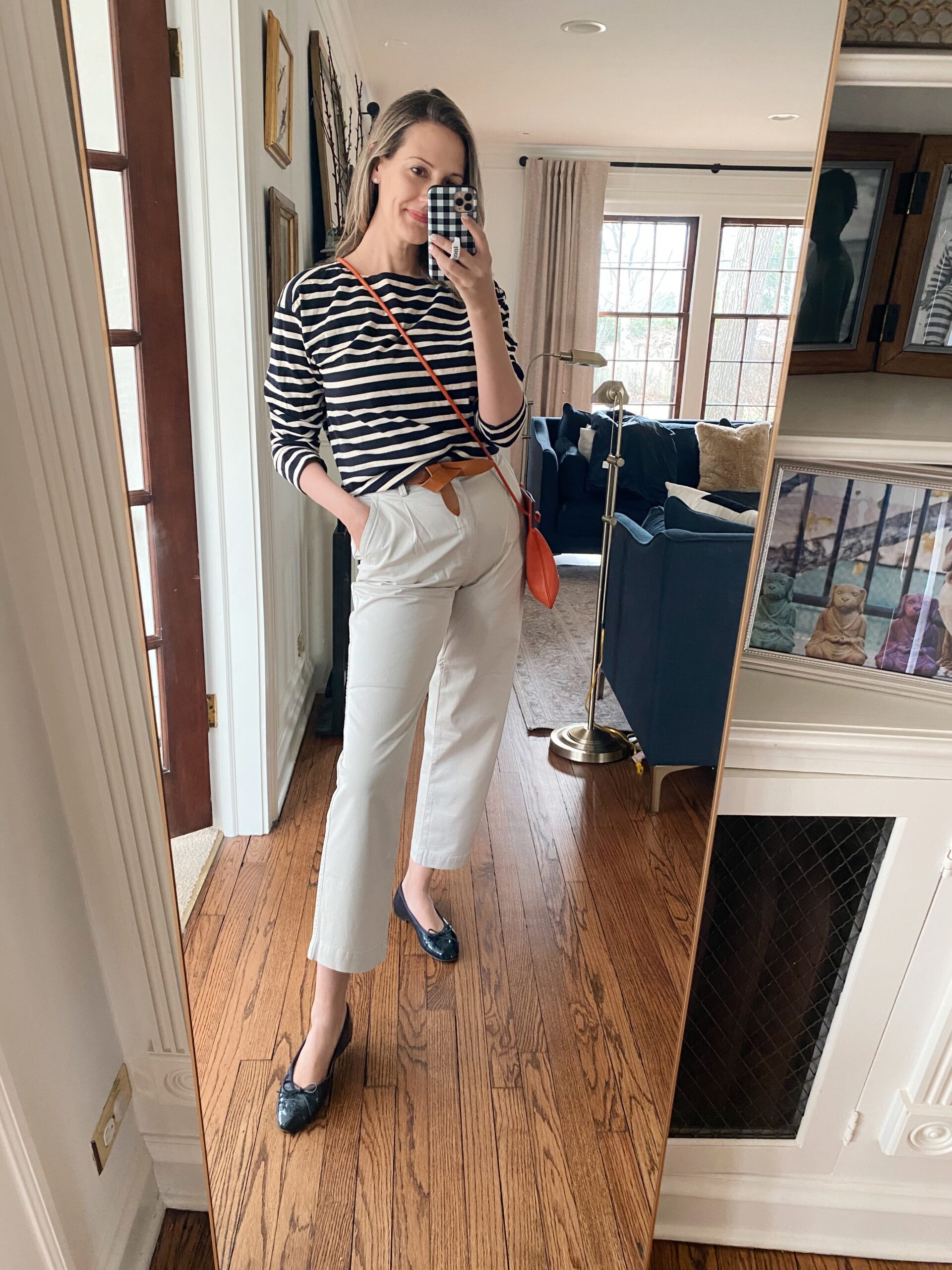 woman wearing stripe black and white and pants for Spring Transition