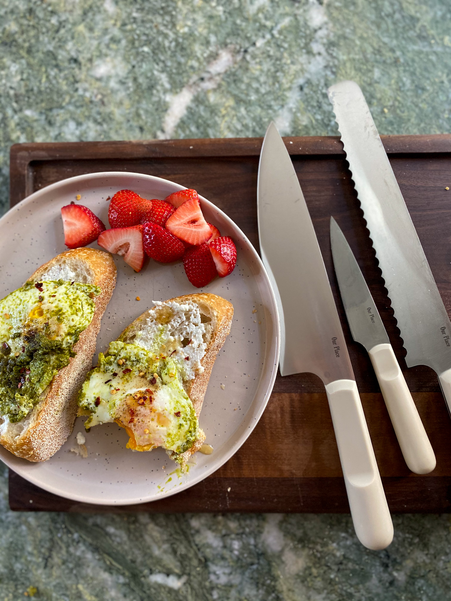 bread and fruits and knives