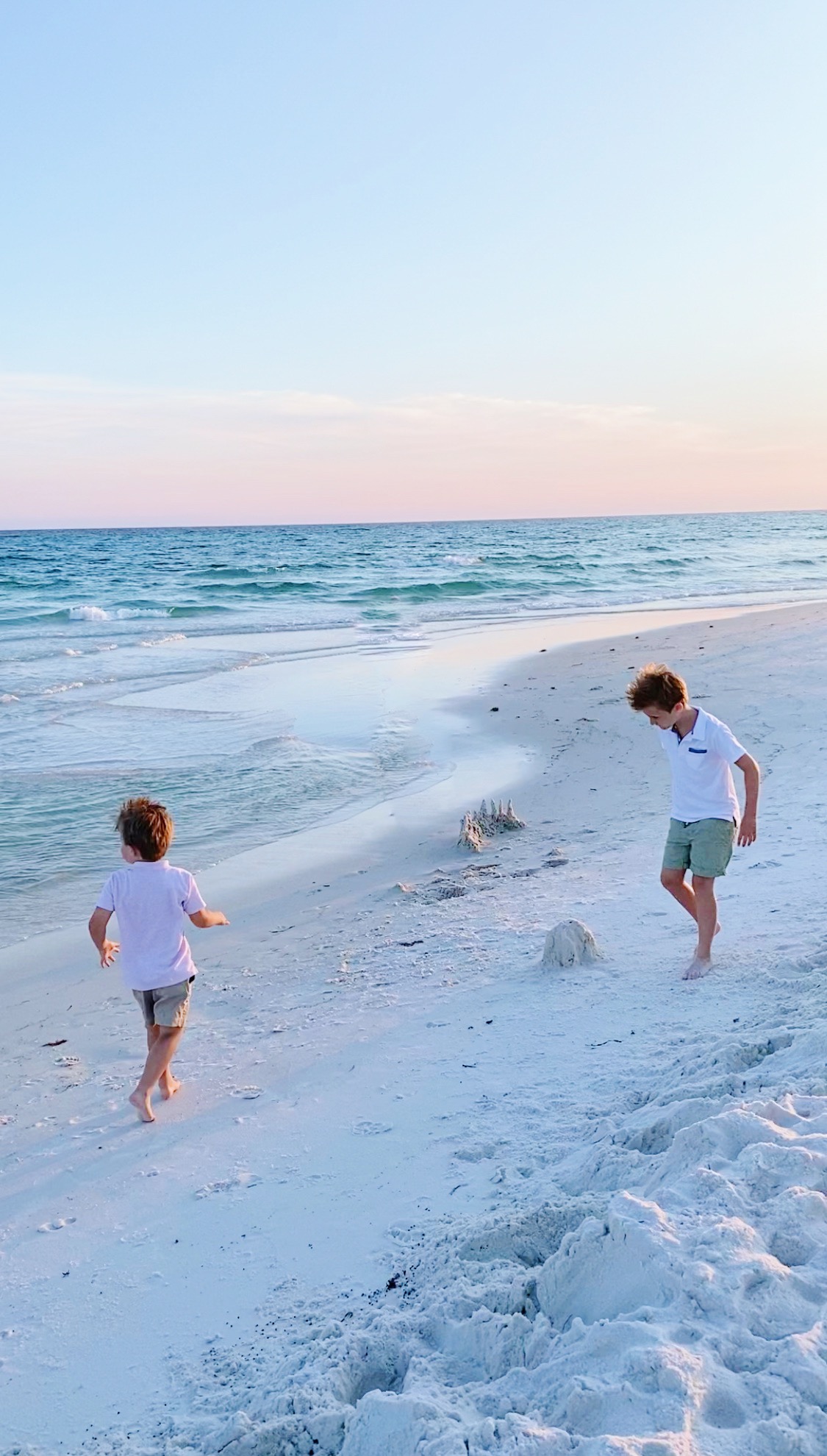 two kids playing at the shore sharing Why I'm Renewing Walmart+