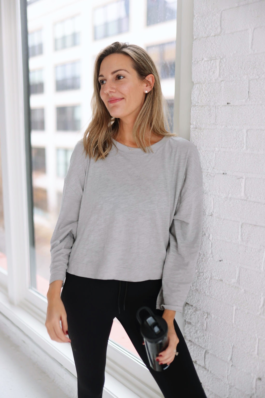 woman wearing grey sweater and Buttery Soft Sweats