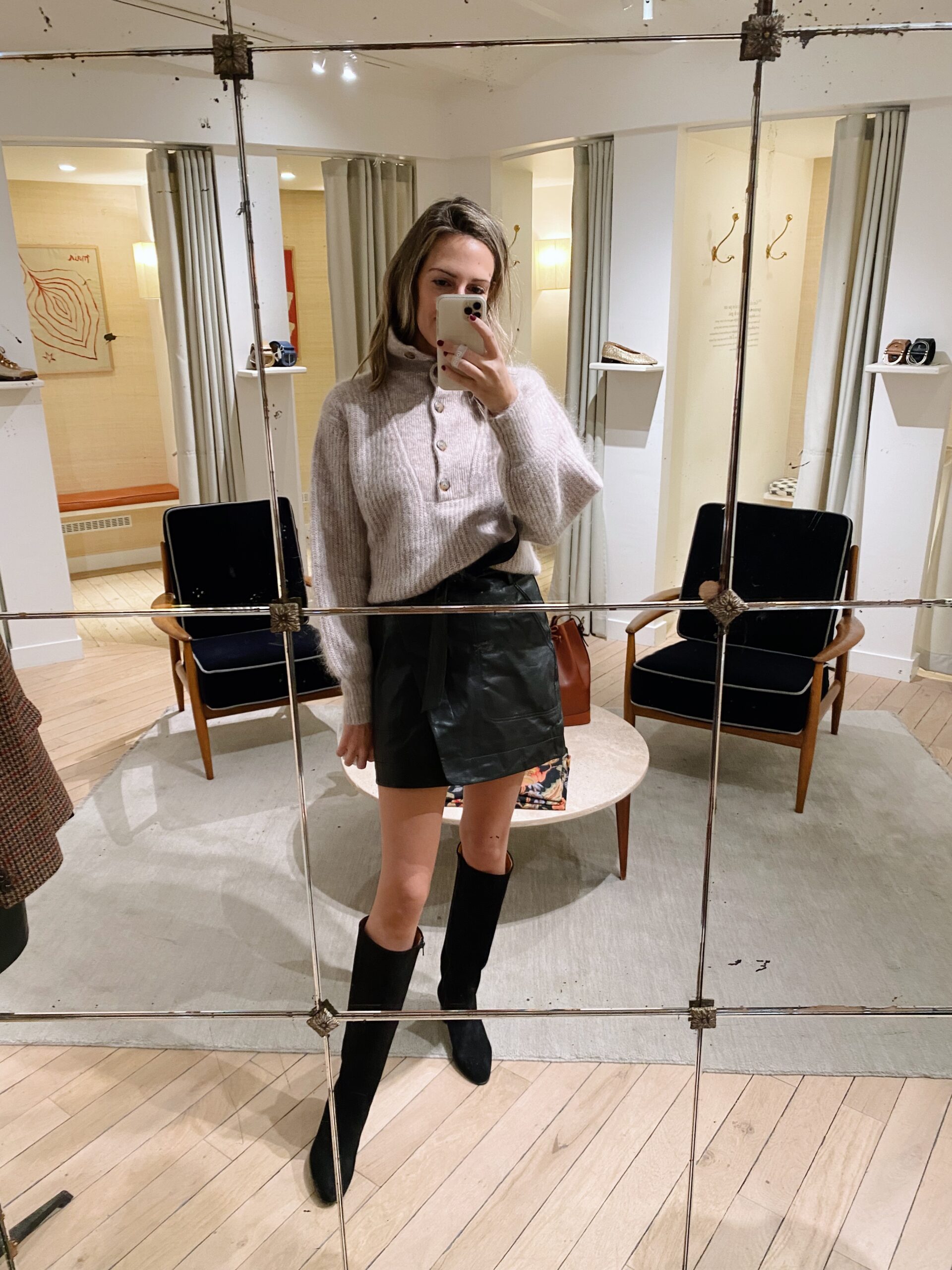 woman wearing grey sweater and leather skirt from Sézane Paris Picks