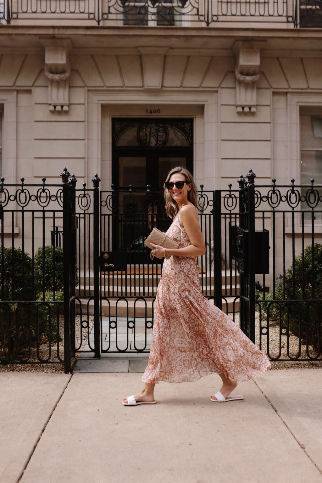 woman in brown floral dress from Spring Break Style