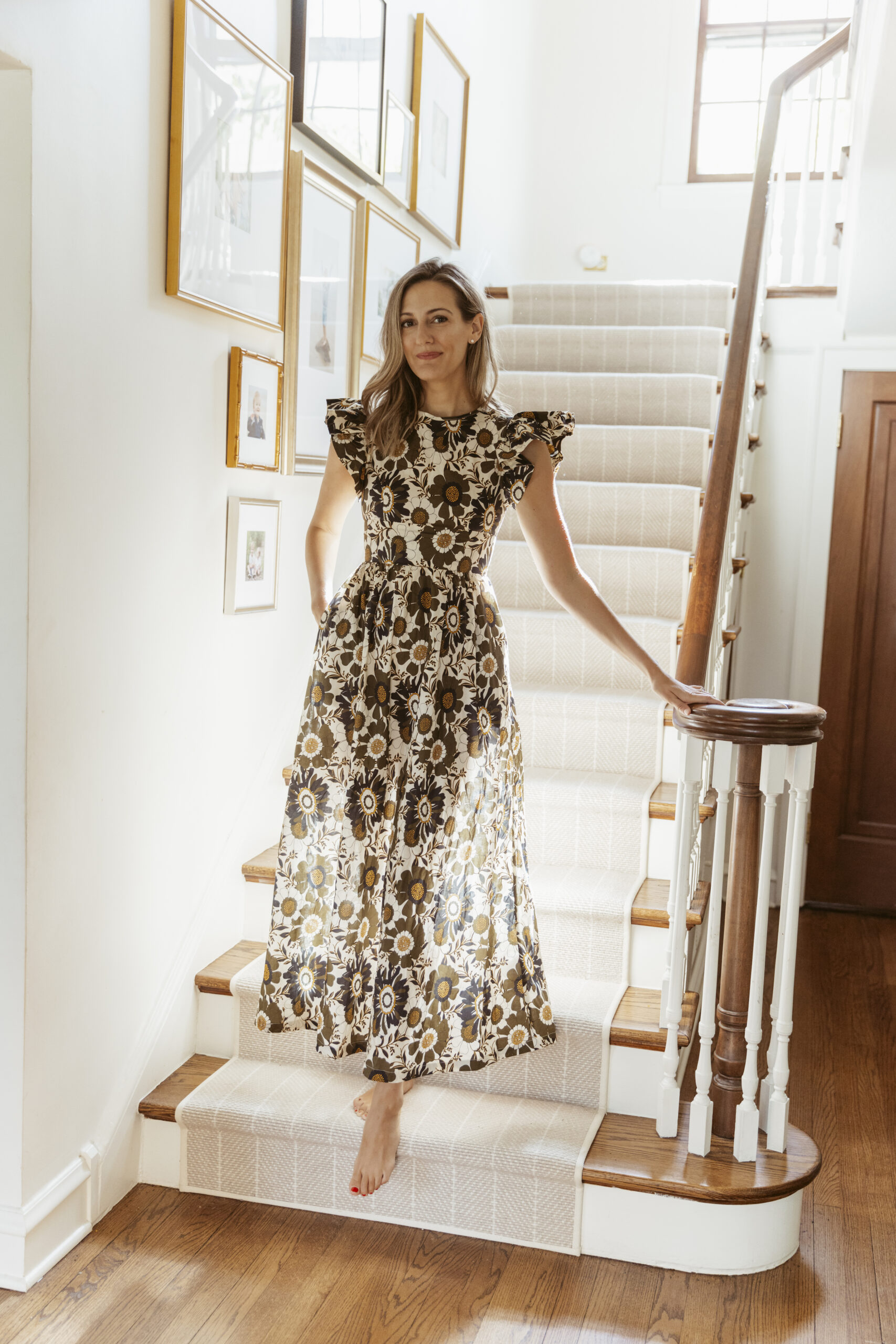 woman in brown printed dress and showing her Stair Runner
