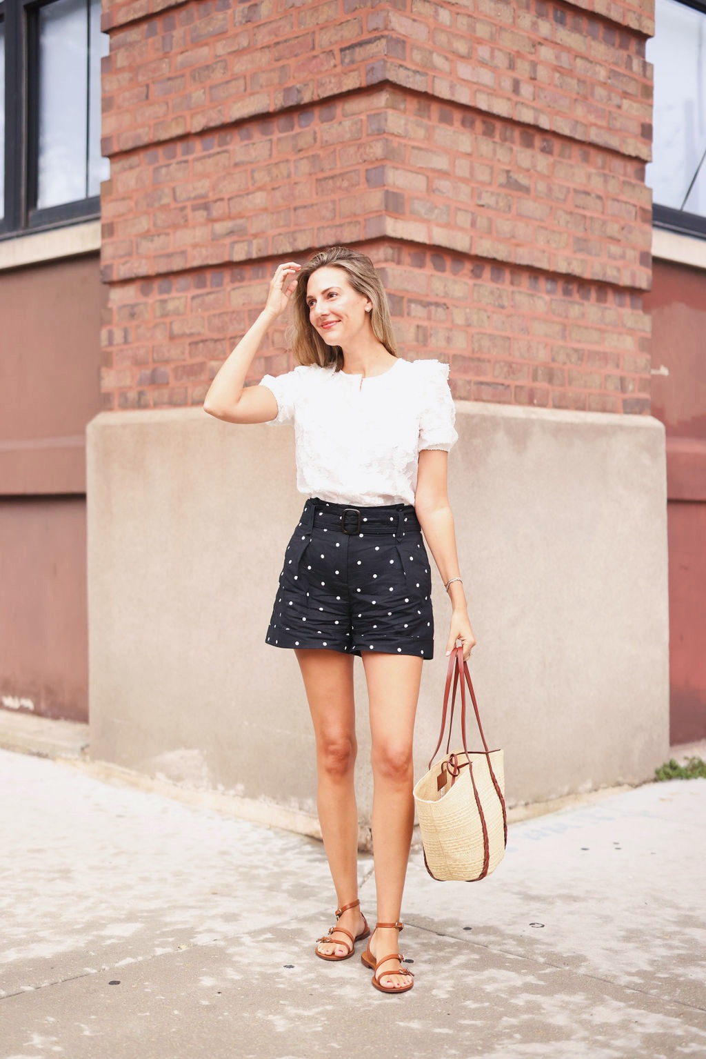 woman wearing black and white outfit from Sézane