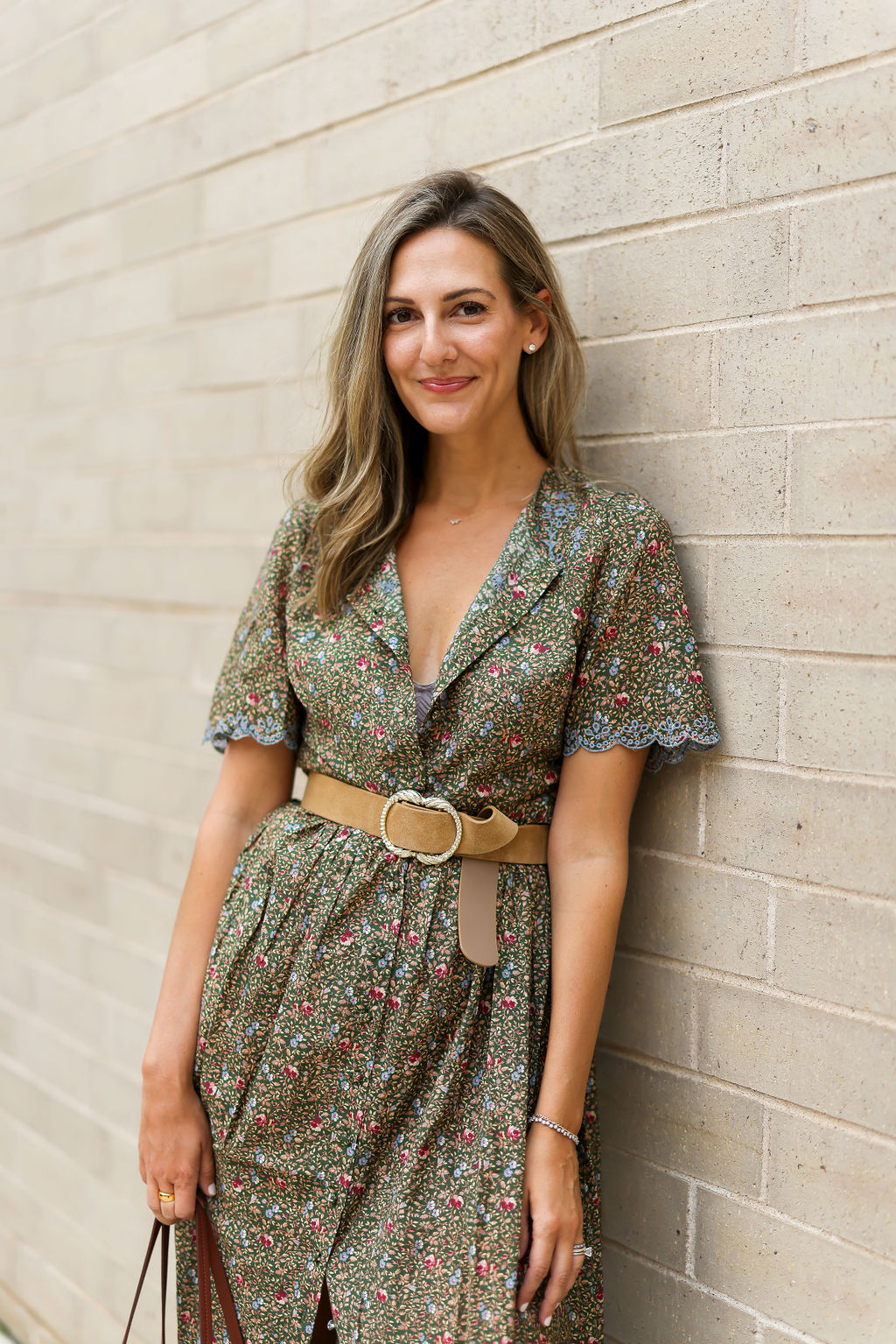 woman wearing Sezane floral dress