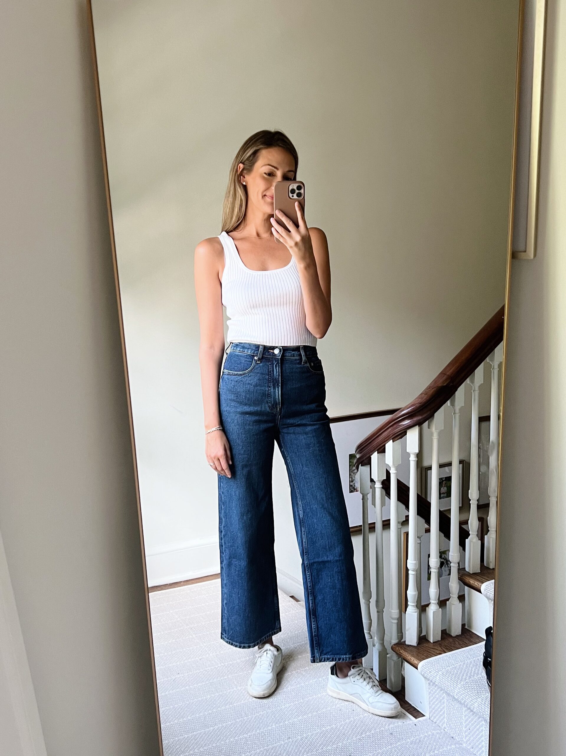 woman in white tank top and jeans for real outfits recap