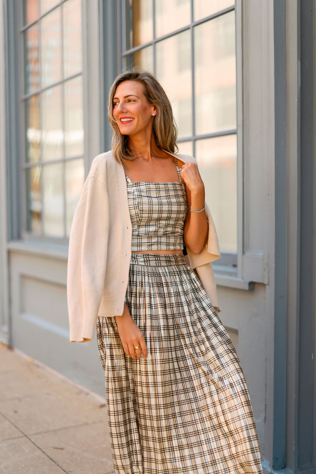 woman Dressing for Fall in coordinates and a cardigan