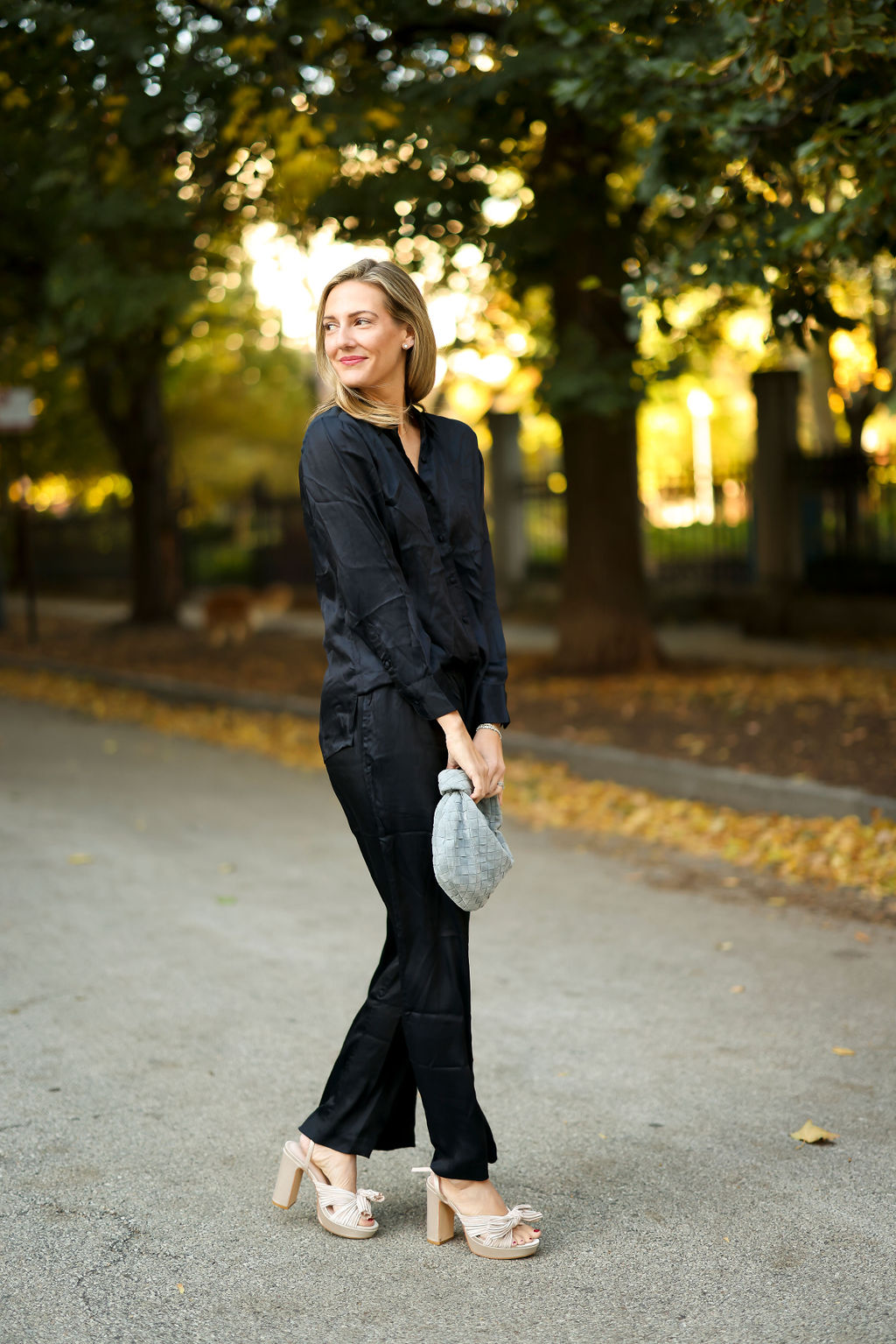 woman wearing all black jumpsuit from ABLE