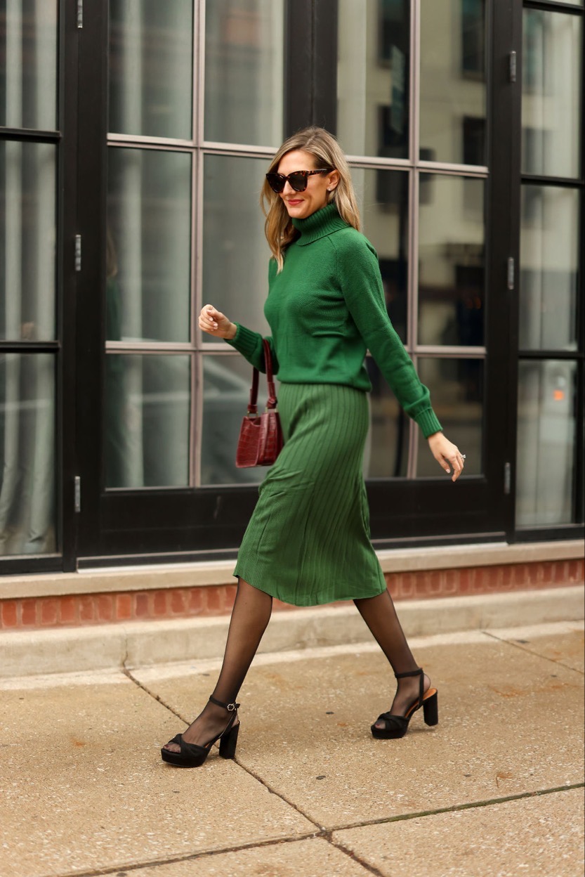 woman walking and wearing Green Sweater Set