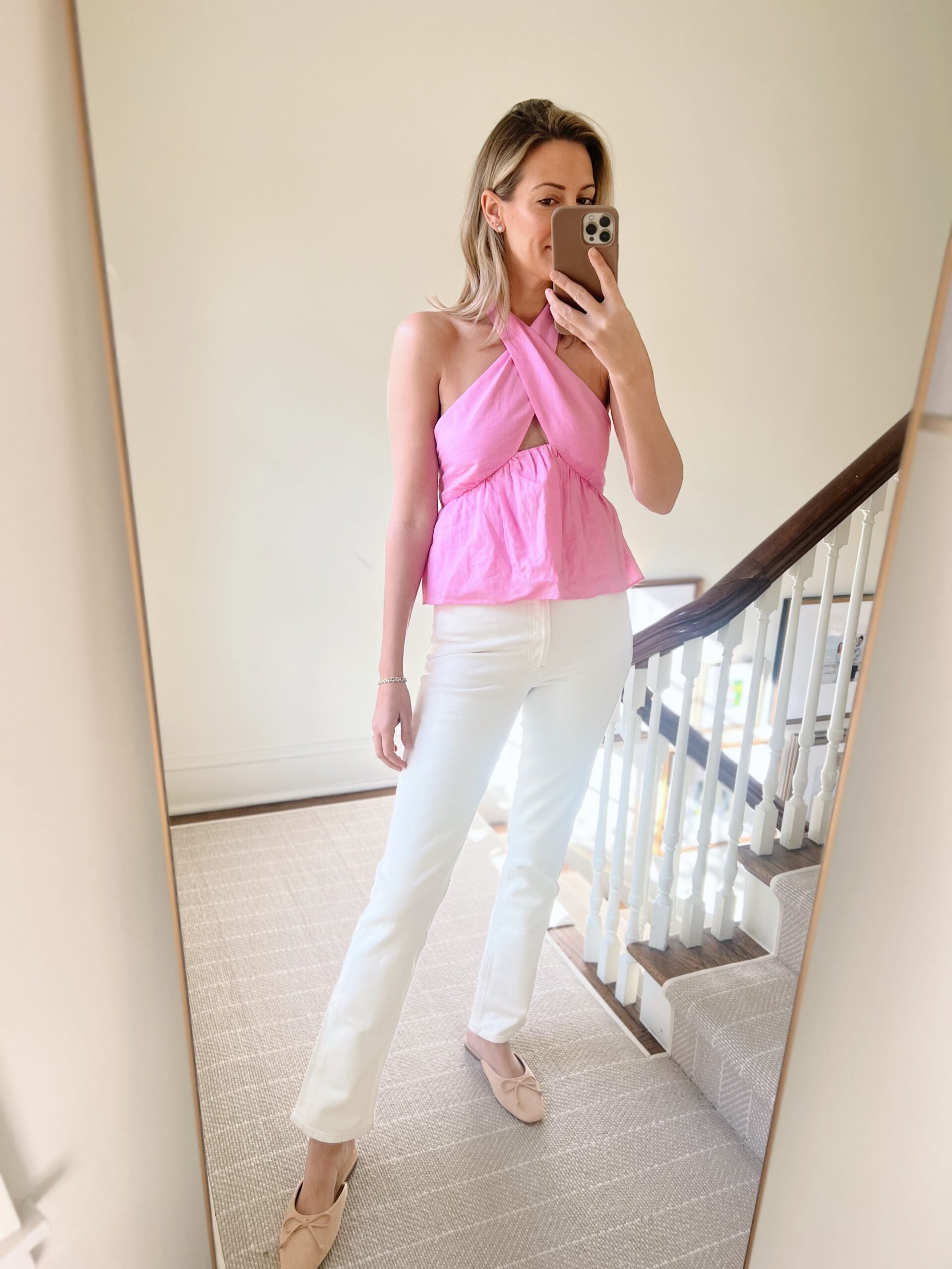 woman wearing pink top and white pants from Spring Break with Saks OFF 5TH