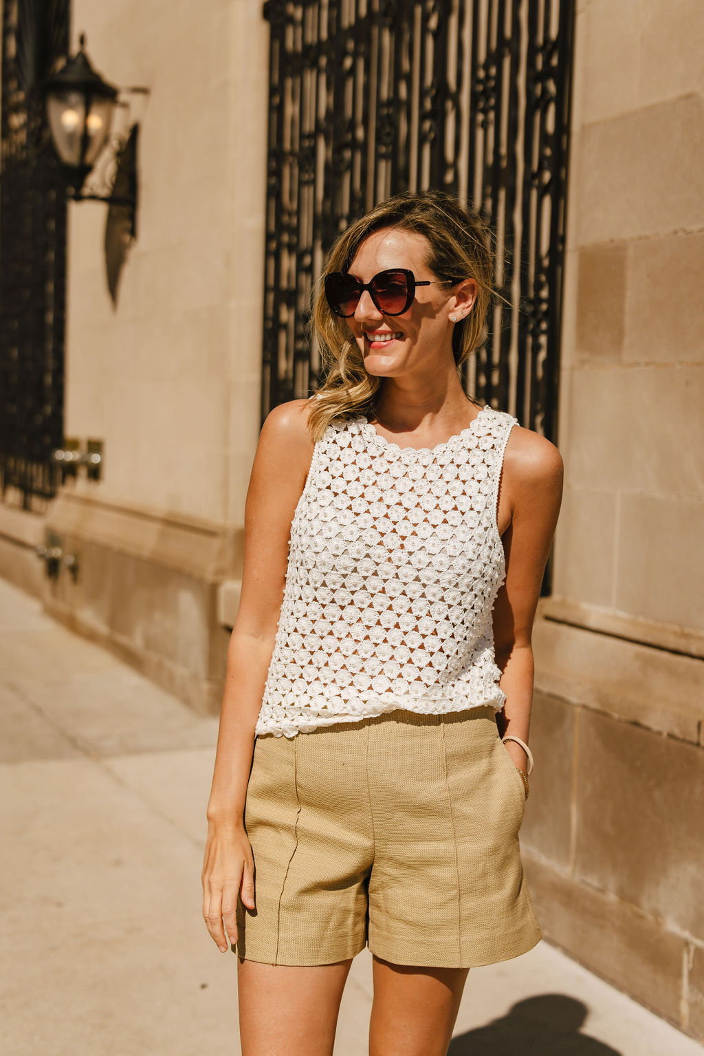 woman in lace top and brown shorts from April Saks OFF 5TH Picks